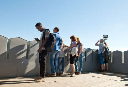 Lviv, Ukraine - July 22, 2016: People enjoying the view on city from the observation deckのeditorial素材