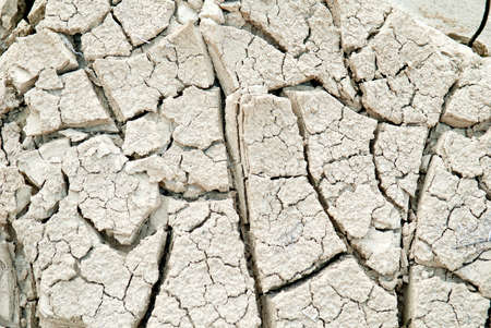 Soil drought cracked into the dry season, textureの写真素材