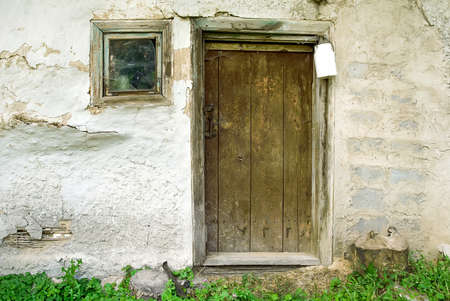 Rustic wooden barn door with white milk can, backgroundの写真素材