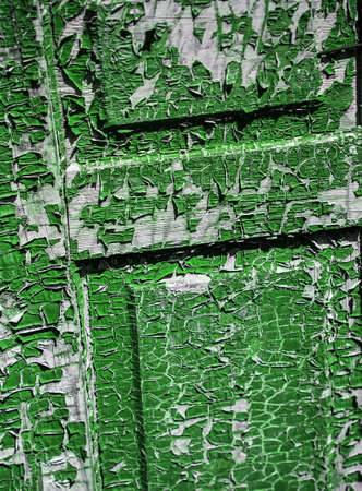 Old shabby wooden door with cracked color paint, backgroundの写真素材