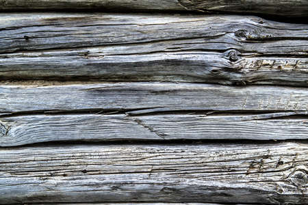 Wooden wall from logs as a background textureの写真素材