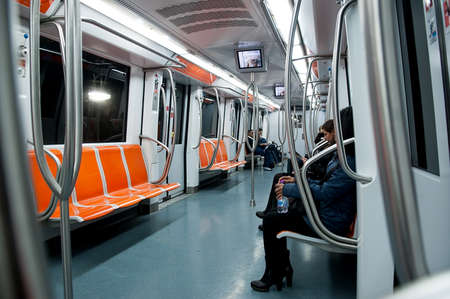 Rome, Italy - November 1, 2012: interior with passengers of Rome's metro. The Rome's Metro which operate on 60.0 kilometres (37.3 mi) of route, serving 73 stationsのeditorial素材
