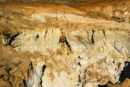 Quarry of clay, clay earthen wall, background, textureの写真素材