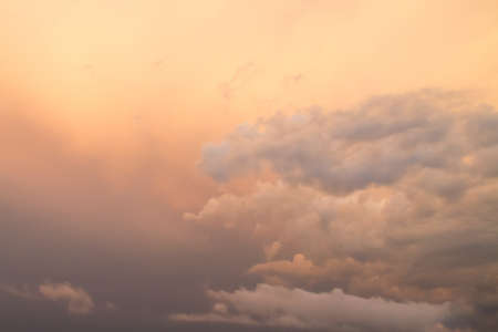 Sunset with clouds after the rain, backgroundの写真素材