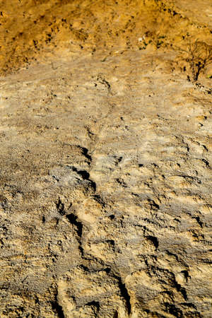 Quarry of clay, clay earthen wall, background, textureの写真素材