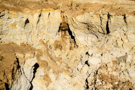 Quarry of clay, clay earthen wall, background, textureの写真素材
