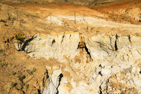 Quarry of clay, clay earthen wall, background, textureの写真素材