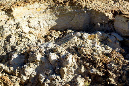 Quarry of clay, clay earthen wall, background, textureの写真素材