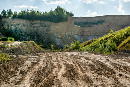 Landscape with a road to the clay quarryの写真素材