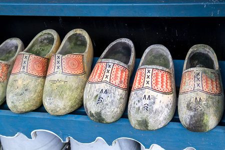 Group of old wooden shoes, vintage hand made in Dutch village