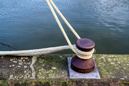 Marina bollard (bitt) to tie mooring ropes for yachts mooringの写真素材