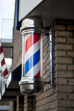 Close-up of an old barber shop signboardの写真素材