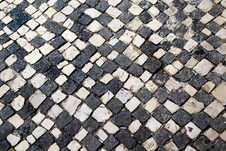 Pavement of black and white. The geometrical pattern. The texture of the pavementの写真素材