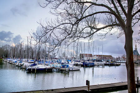 View on the yacht harbor at the evening, Hoorn, Netherlandsの写真素材