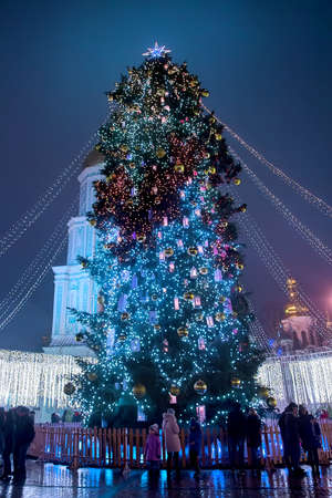 Kyiv, Ukraine - January 3, 2018: Beautiful view of Christmas tree on Sophia Square in Kyiv, Ukraine. Main Kyiv's New Year tree and Saint Sophia Cathedral on the backgroundのeditorial素材