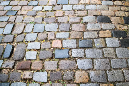 Abstract background of old cobblestone pavementの写真素材
