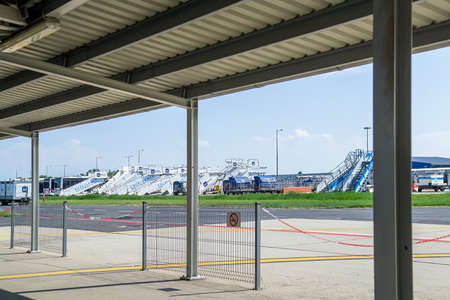 Budapest, Hungary - Aug 3, 2018: Movable passenger's boarding ramps standing on the airfieldのeditorial素材