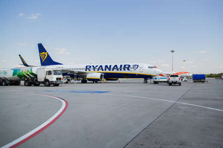 Budapest, Hungary - Aug 3, 2018: Busy airport view with airplanes and service vehiclesのeditorial素材