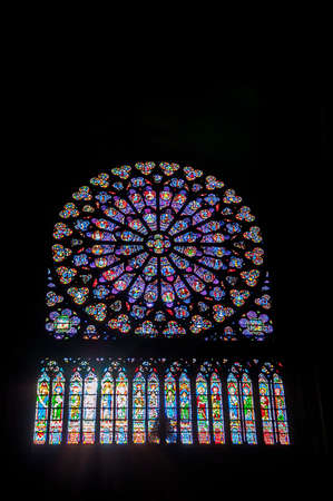Paris, France - November 4, 2012: The North Rose window at Notre Dame cathedral dates from 1250 and is also 12.9 meters in diameter. Its main theme is the Old Testament. Selective focusのeditorial素材