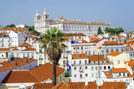 View from the Miradouro Santa Luzia to the old town of Lisbon, behind the monastery church Sao Vincente de Fora, district Alfama, Lisbon, Portugalの写真素材