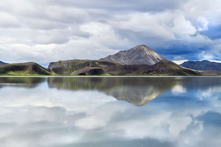 Beautiful landscape of Icelandic- mountain reflected on the lakeの写真素材