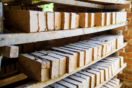 Clay brick factory, bricks used for building construction. Selective focusの写真素材