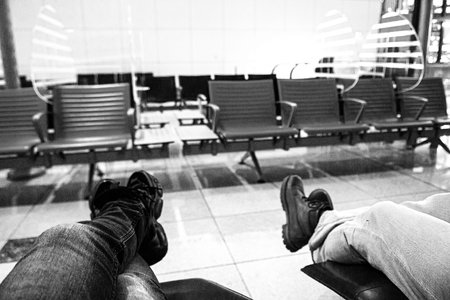 Airport Waiting Area Feet Resting Seats. Selective focusの写真素材