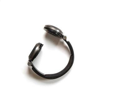 Broken headphones as a concept of the fragility of plastic use. Copy spaceの写真素材