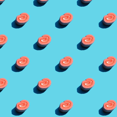 Bright pink sweet delicious pastry pattern seamless on blue backgroundの写真素材