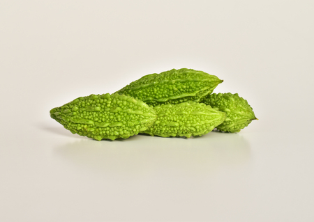 Green fresh Momordica charantia isolated on white backgroundの写真素材