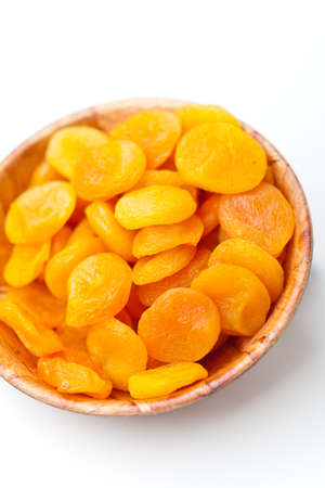 ied apricots on a white background の写真素材