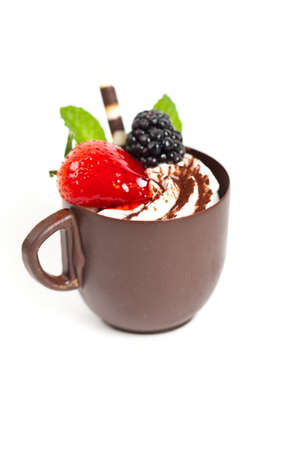 Chocolate coffee cup filled whith mousse creamの写真素材