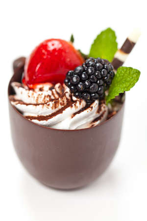 Chocolate coffee cup filled whith creamの写真素材