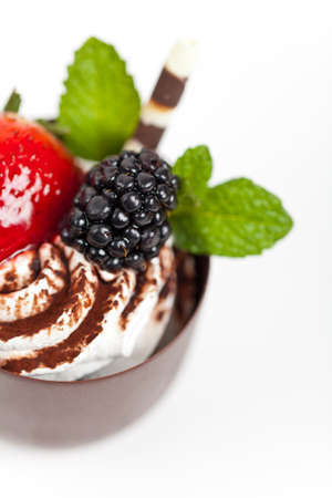 Chocolate coffee cup filled whith creamの写真素材