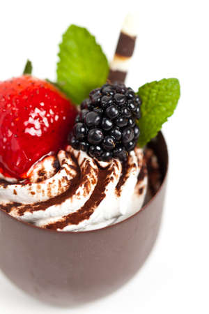 Chocolate coffee cup filled whith mousse creamの写真素材