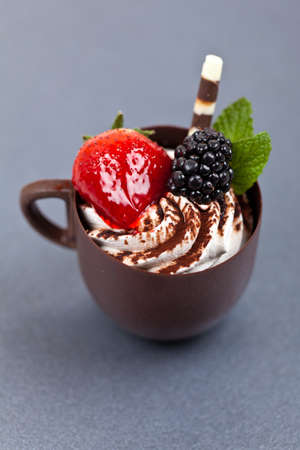 Chocolate coffee cup filled whith mousseの写真素材