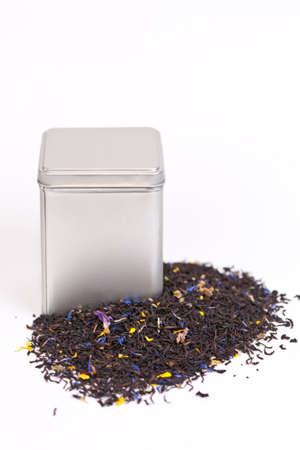 Silver tea box with green fruit teaの写真素材