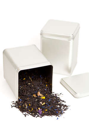 Silver tea box with green fruit tea の写真素材