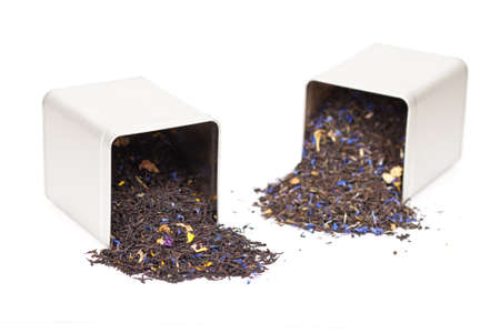 Tea spilling out of a tea boxの写真素材