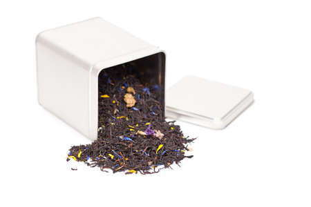 Tea spilling out of a tea boxの写真素材