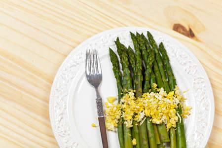 Asparagus dish with eggsの写真素材