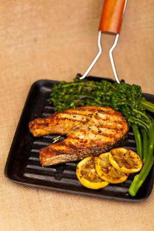 Salmon With Grilled Broccolini And Lemonの写真素材