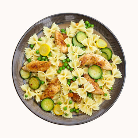 Pasta with fried zucchini and chickenの写真素材