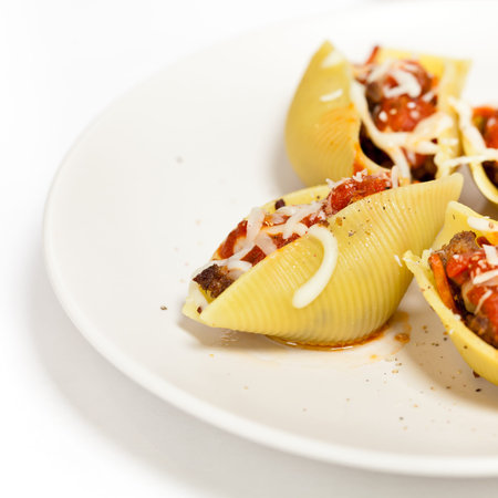 Big pasta shells staffed with meat, cheese and tomato sauce