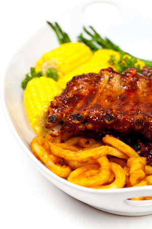 Freshly Grilled BBQ Ribs with Cornの写真素材