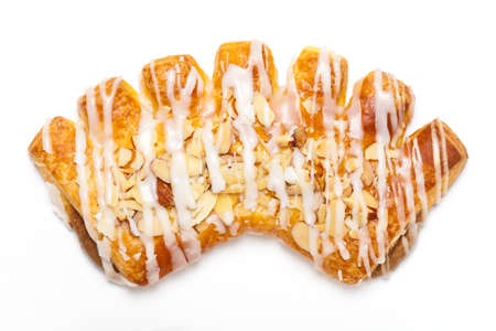 Bear claw pastry with sliced almonds and sugarの写真素材