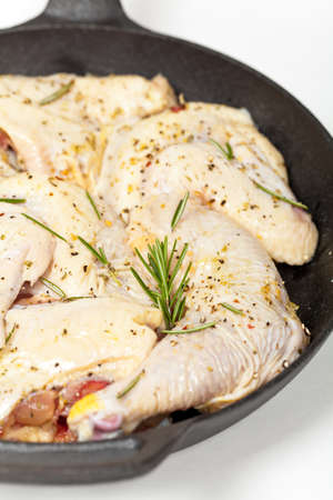 Raw Chicken with Rosemary ready to cookの写真素材