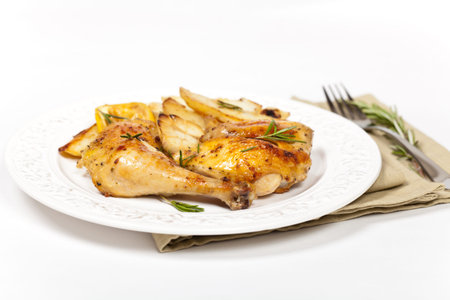 Roasted chicken thighs with Rosemary  Selective focus 