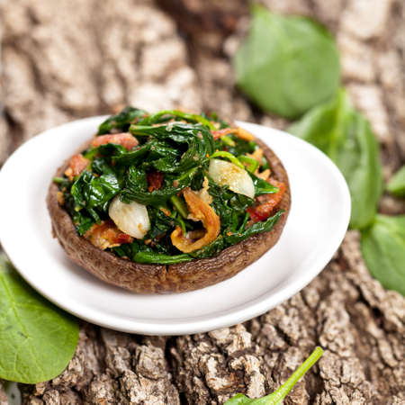 Stuffed mushroom with spinach and bacon の写真素材