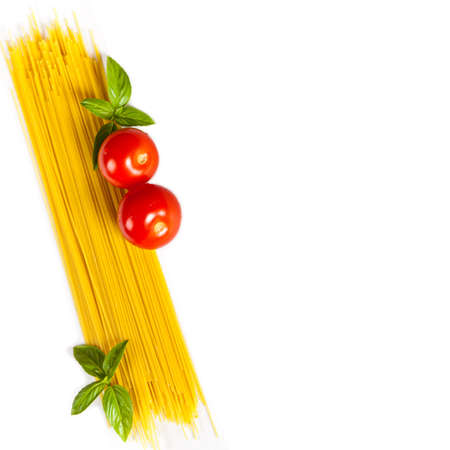 Italian Food. Pasta, Tomatoes, Basil with free text space. Selective focus.の写真素材